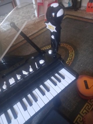 Piano elettronico per bambini con microfono