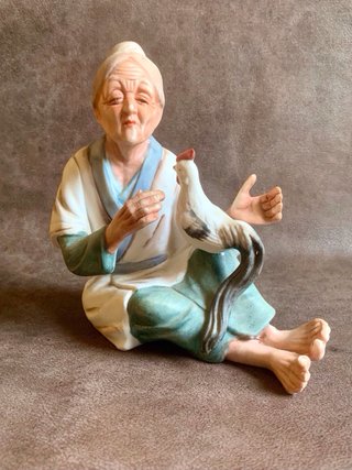 PAREJA DE ANCIANOS JAPONESES EN PORCELANA.