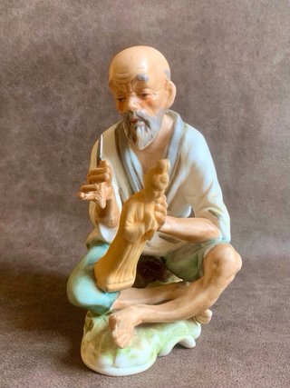 PAREJA DE ANCIANOS JAPONESES EN PORCELANA.