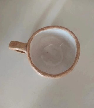 Taza artesanal cerámica beige y marrón