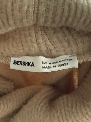 Jersey corto beige cuello alto