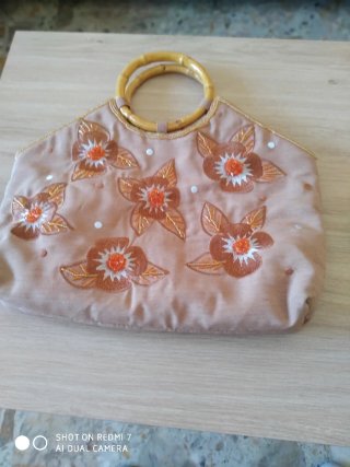 Bolso vintage beige con flores. Sin envío