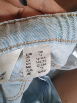 Pantalón vaquero claro roto ancho 12 -13 años