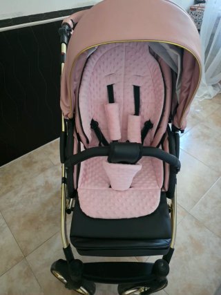 Cochecito de bebé alta gama rosa y dorado