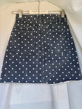 Mini falda tejana negra con topos blancos