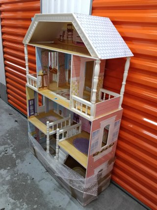Casa de muñecas de madera