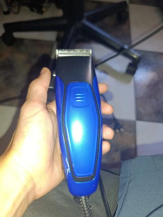Maquinilla de afeitar eléctrica azul