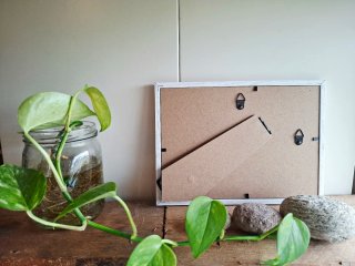 Quadro Home con sassi e cuori rossi