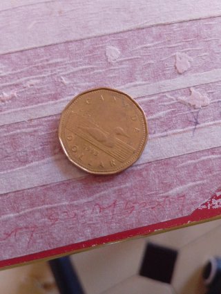 Monedas Dólar y Pence Canadienses