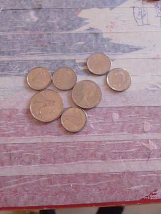 Monedas Dólar y Pence Canadienses