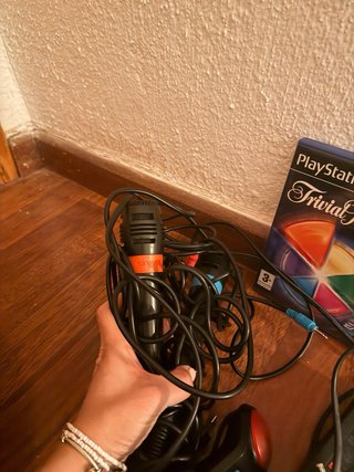 PlayStation 2 Negra con mandos, micrófonos y juego