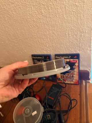 PlayStation 2 Negra con mandos, micrófonos y juego