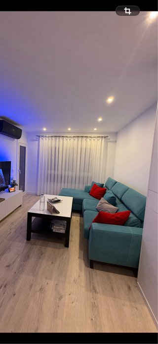 Sofá modular turquesa con cheslong
