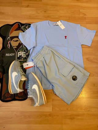 Conjunto Ami Paris y CP Company