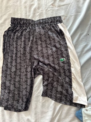 Conjunto deportivo Lacoste negro y blanco