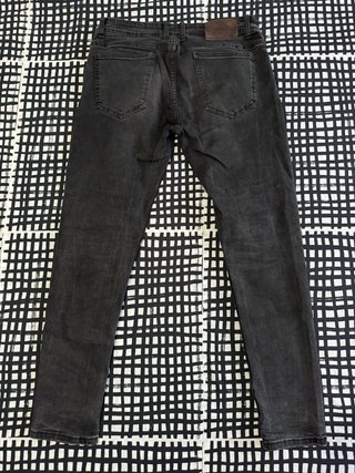 Vaqueros Drip Slim Fit Negros de Area Zero