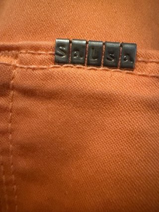 Pantalones pitillo Salsa naranjas
