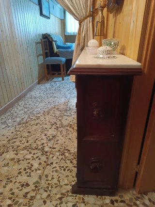 Entradita vintage mármol y madera