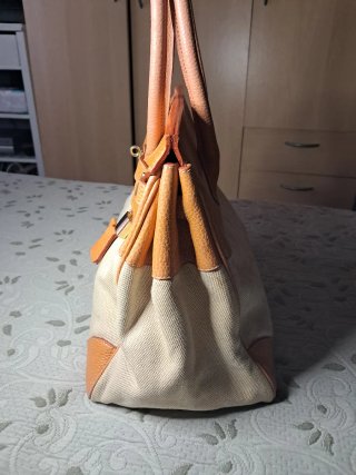 Bolsa Jarina. Model tipo Hermes  naranja oscura.