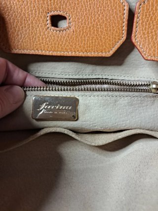 Bolsa Jarina. Model tipo Hermes  naranja oscura.