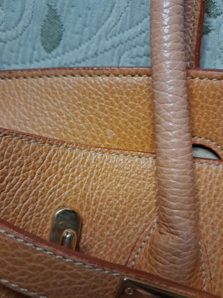 Bolsa Jarina. Model tipo Hermes  naranja oscura.