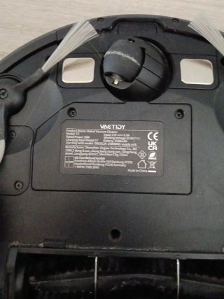 Robot Aspirador Vactidy Negro en su caja.