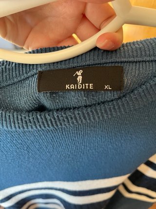 Jersey azul con rayas blancas