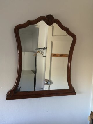 Espejo antiguo de madera y cristal