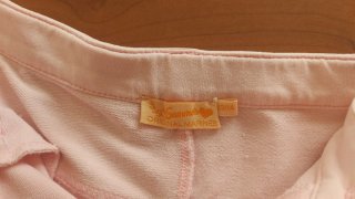 Bermuda jeans bianchi con sfumatura rosa