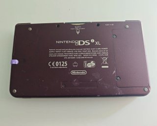 Nintendo DSi XL + New Super Mario Bros.