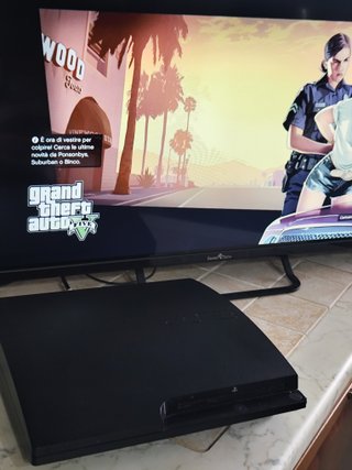 PlayStation 3 Slim + 10 Giochi Top + 2 Controller