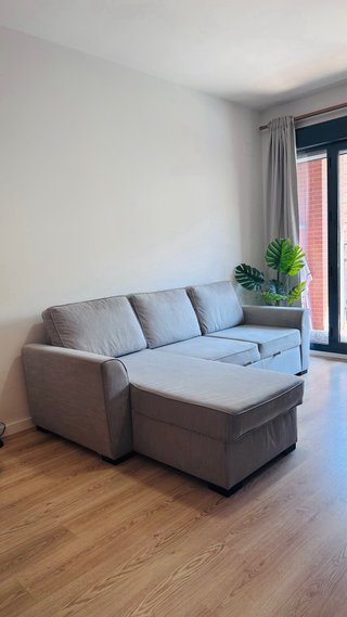 Sofá cama esquinero gris tela