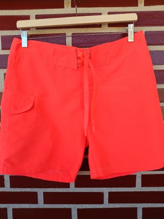 Bañador surfero naranja con bolsillo