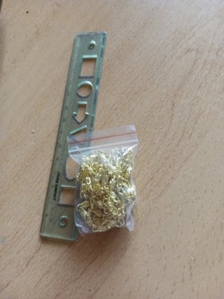 Bolso de fiesta marrón y dorado