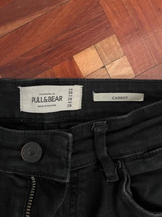 Pantalones negros rotos