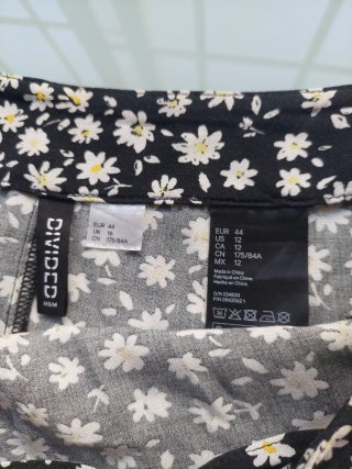 Falda H&M floral midi con abertura