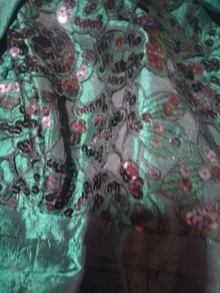 Vestido de fiesta verde con chaqueta
