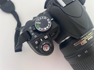 Nikon D3100 réflex digital  objetivo original