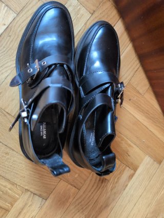 Botines plataforma negros con hebillas