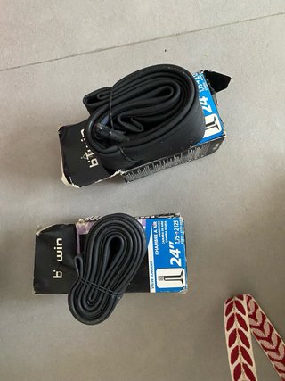 Bicicleta Decathlon Blanca y Naranja