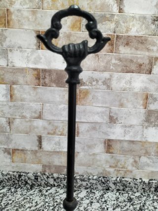 Tope de puerta de hierro fundido