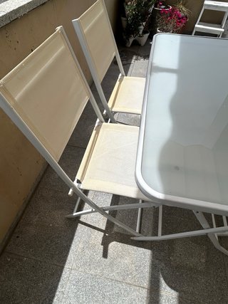 Conjunto mesa y sillas terraza cristal