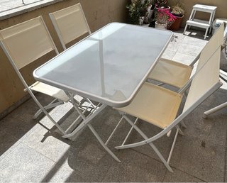 Conjunto mesa y sillas terraza cristal
