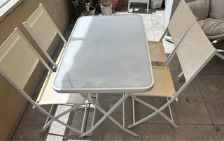 Conjunto mesa y sillas terraza cristal