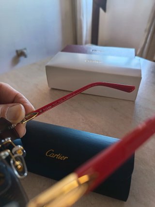 Occhiali da sole Cartier rossi