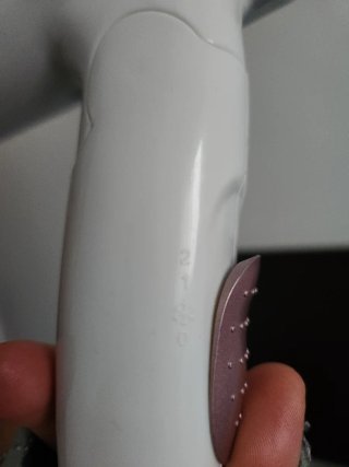 Secador de pelo blanco y rosa