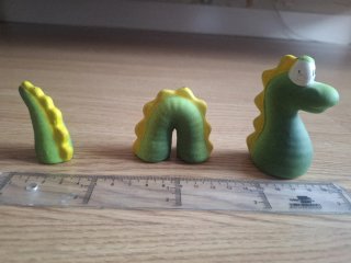 Figuras de cerámica de monstruo de lago