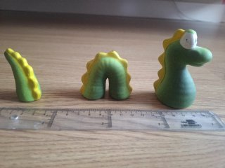 Figuras de cerámica de monstruo de lago