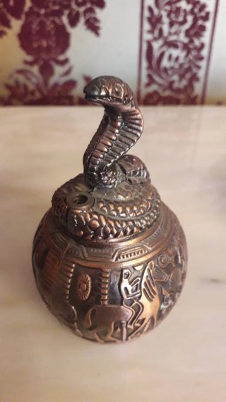 4 Mecheros de metal en tono cobre coleccionistas.