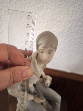 Figura de porcelana: cazador con perro